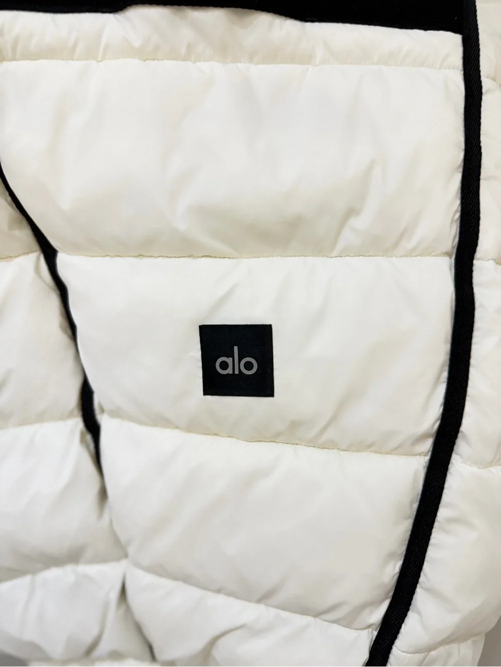 ALO Yoga White Puffer Jacket with Black Label